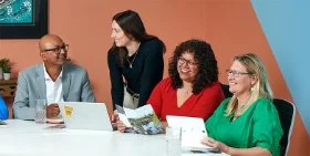 Business and Tourism Services team members in a meeting