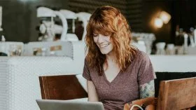 A woman working on her laptop