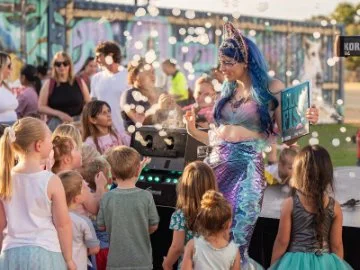 A woman dressed as a mermaid at the 2024 Under the Sea at LoCale eventspace, Midland