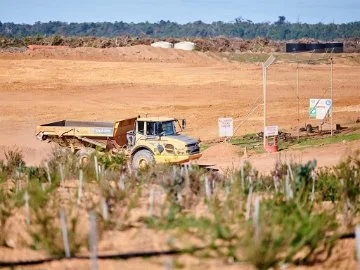 A truck drives through the waste facility