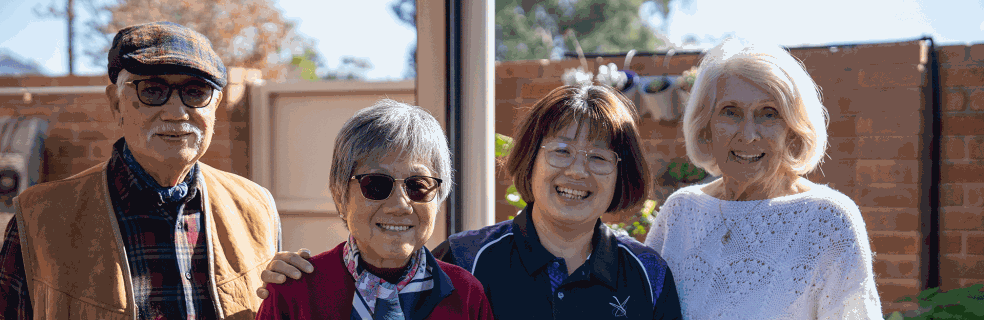 Laughing seniors at Swan Caring with a City worker