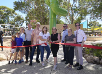 Representatives from State and local government cut the ribbon at Ballajura Intergenerational Playspace