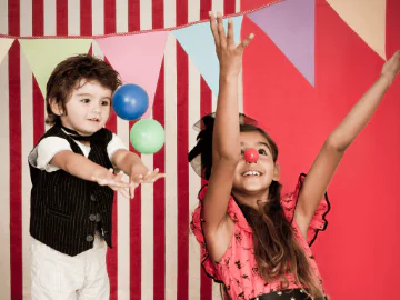 Children playing in theatre costumes 